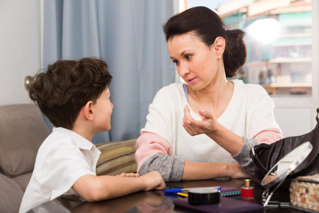 concerned mom talks to her son