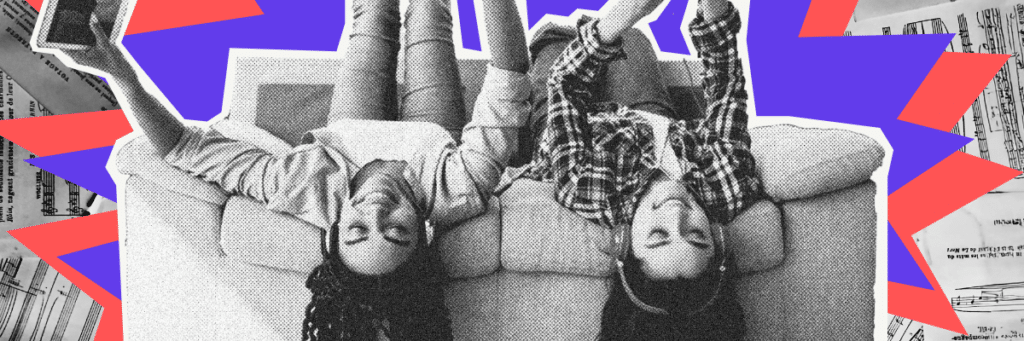 teen girls upside down listening to music on a couch