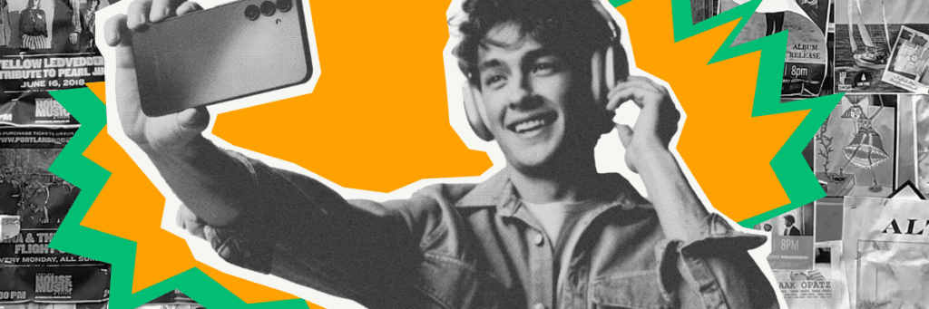 teen boy taking selfie wearing headphones