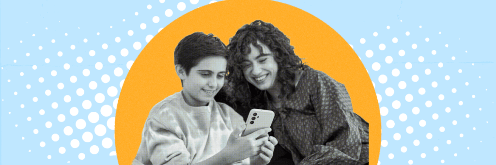mom and son smiling at cell phone